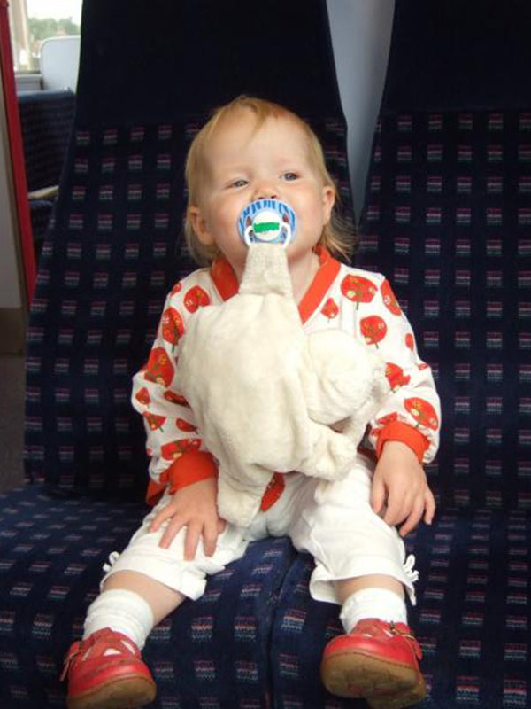 Fifi on the bus with her Sleepytot comforter
